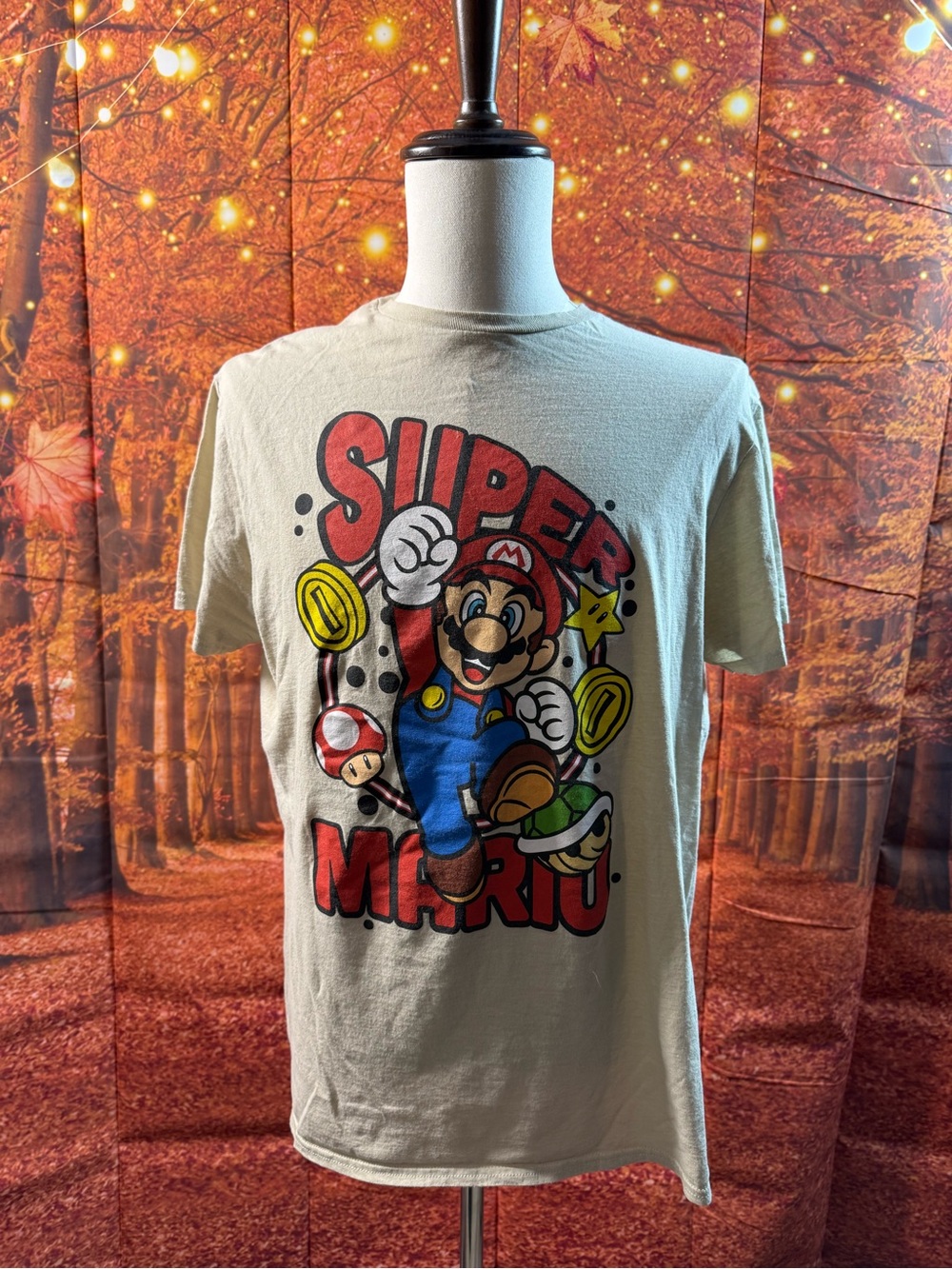 319-Nintendo Super Mario Cream Tee with Red, Blue, Yellow and Green Graphic